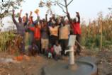 Praise God! . . . with Pastor David, his wife Regina and their family for fresh water for their community